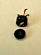 thumbnail photo of a tiny transistor with its epoxy cap popped off