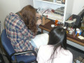 photo two people working on making a breadboard for tuning the one-shots